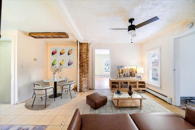 239-241 Hurleyville Main St, Hurleyville, NY 12747 - living room featuring a baseboard radiator, light tile patterned floors, a ceiling fan, a textured ceiling, and beamed ceiling