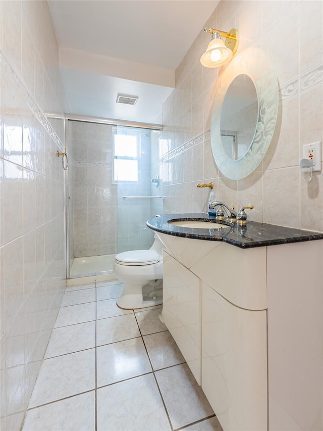 42-51247THST 247th St, Little Neck, NY 11363 - bathroom with tile walls, tile patterned flooring, vanity, a shower stall, and toilet