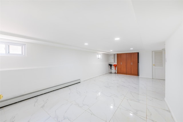 42-51247THST 247th St, Little Neck, NY 11363 - below grade area featuring a baseboard heating unit, recessed lighting, light marble finish flooring, and baseboards