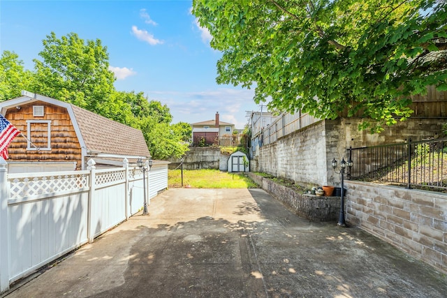 42-51247THST 247th St, Little Neck, NY 11363 - fenced backyard featuring a patio area