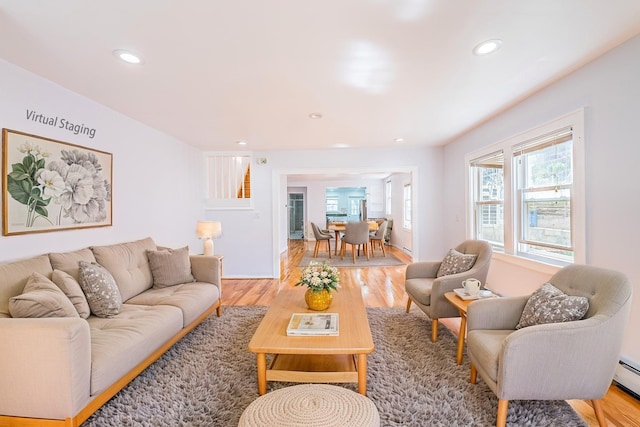 42-51247THST 247th St, Little Neck, NY 11363 - living area featuring light wood-type flooring, recessed lighting, and a baseboard radiator