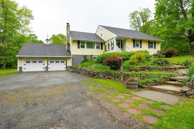 136 Foggintown Rd, Brewster, NY 10509 - ranch-style house with a chimney and asphalt driveway