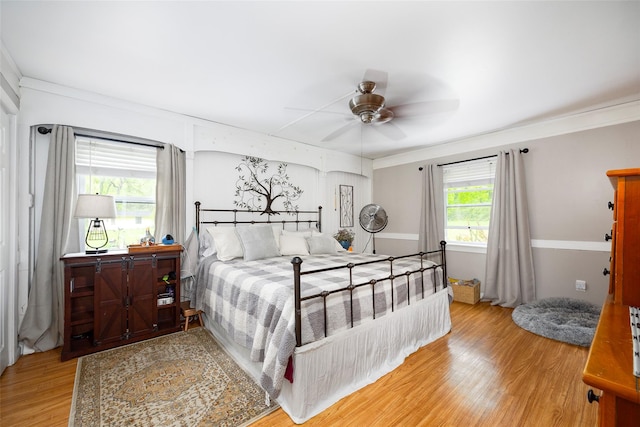 136 Foggintown Rd, Brewster, NY 10509 - bedroom featuring light wood finished floors, crown molding, and a ceiling fan