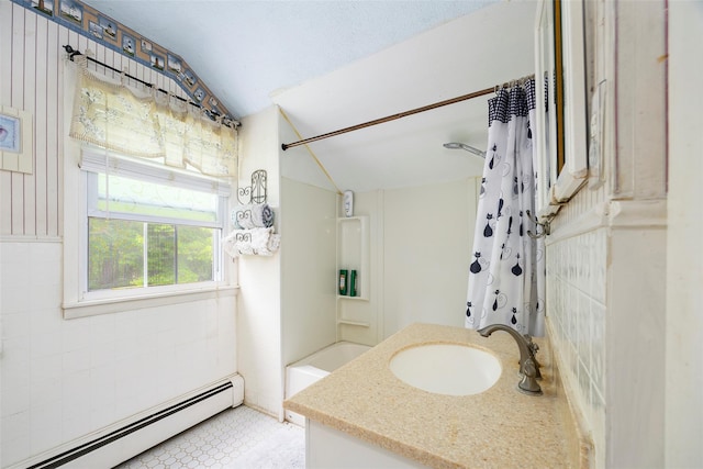 136 Foggintown Rd, Brewster, NY 10509 - bathroom with baseboard heating, vaulted ceiling, shower / bath combination with curtain, and vanity