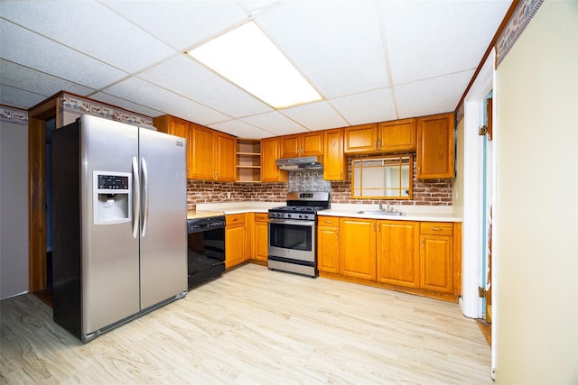 136 Foggintown Rd, Brewster, NY 10509 - kitchen with stainless steel appliances, a drop ceiling, open shelves, light wood-style flooring, and light countertops