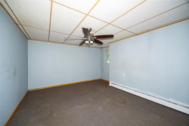 136 Foggintown Rd, Brewster, NY 10509 - unfurnished room with a baseboard heating unit, carpet, baseboards, a ceiling fan, and a drop ceiling