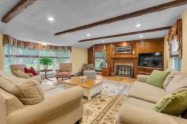 living area with light wood-type flooring, beamed ceiling, a glass covered fireplace, recessed lighting, and an AC wall unit