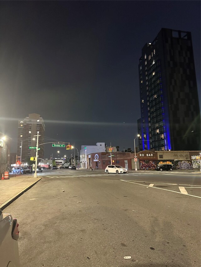 51-17 34th St, Long Island City, NY 11101 - view of asphalt road featuring street lights and traffic lights