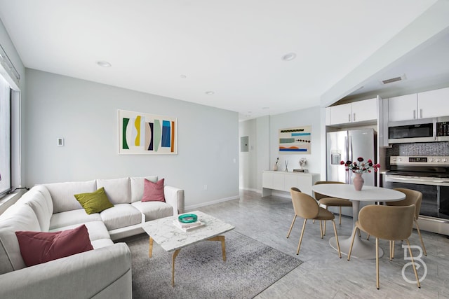 31-10 28th Rd Unit 1A, Astoria, NY 11102 - living room with baseboards
