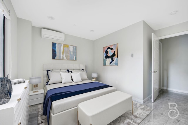31-10 28th Rd Unit 1A, Astoria, NY 11102 - bedroom featuring a wall mounted air conditioner, baseboards, and marble finish flooring