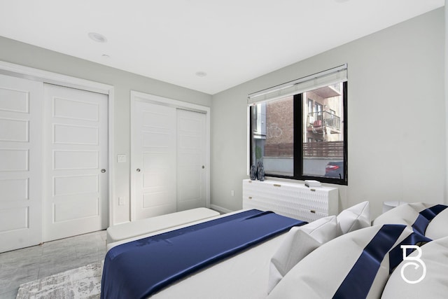 31-10 28th Rd Unit 1A, Astoria, NY 11102 - bedroom featuring a closet and baseboards