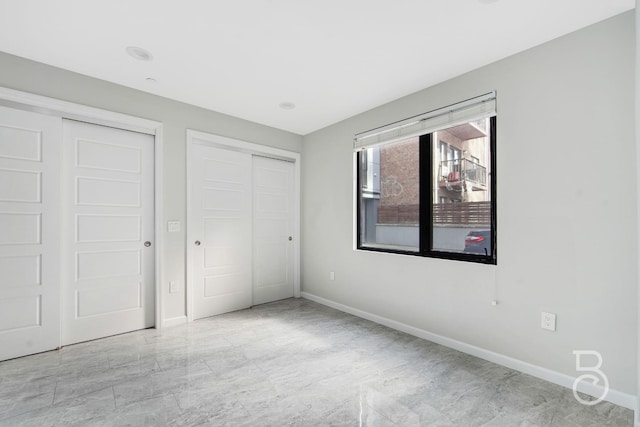 31-10 28th Rd Unit 1A, Astoria, NY 11102 - unfurnished bedroom featuring baseboards