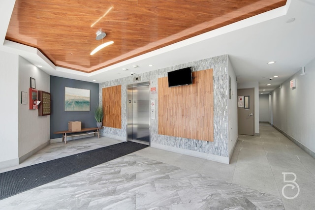 31-10 28th Rd Unit 1A, Astoria, NY 11102 - building lobby featuring wood ceiling and recessed lighting