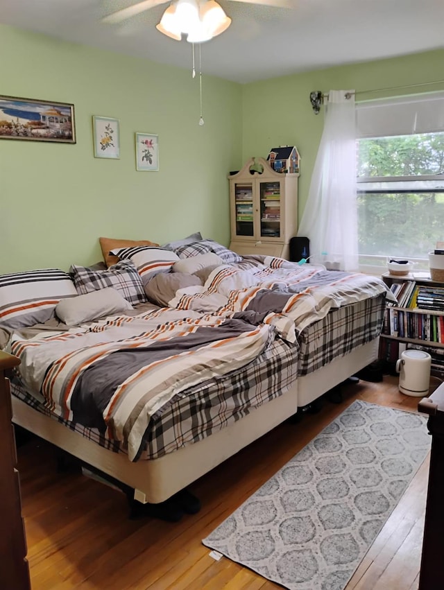 284 Central Ave Unit D-6, Lawrence, NY 11559 - bedroom featuring wood finished floors and a ceiling fan
