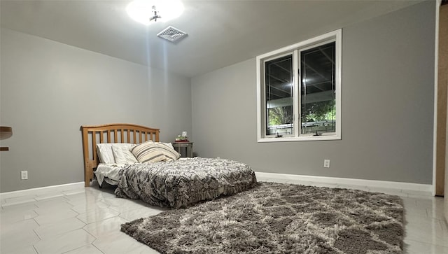 bedroom with baseboards