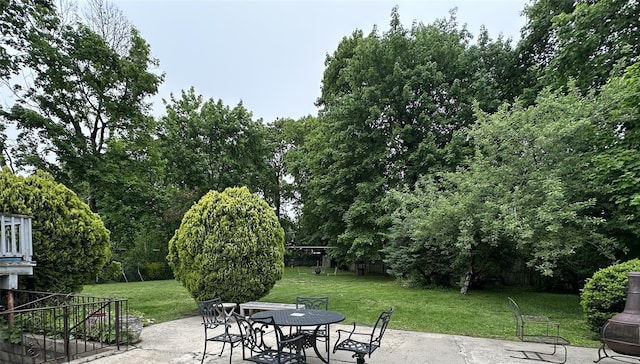 view of patio with outdoor dining space