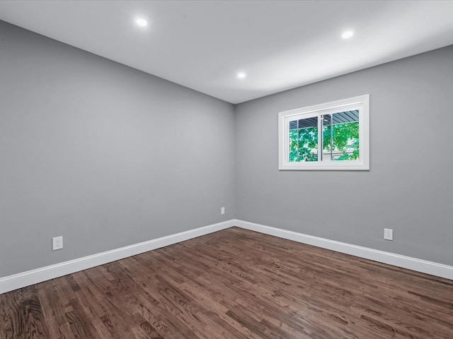 7 Pal Way, Plainview, NY 11803 - empty room with dark wood-style floors, baseboards, and recessed lighting