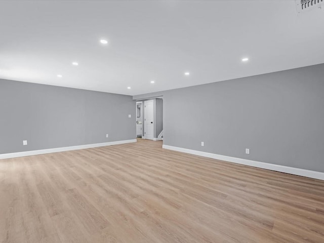 7 Pal Way, Plainview, NY 11803 - unfurnished room with recessed lighting, light wood-type flooring, and baseboards
