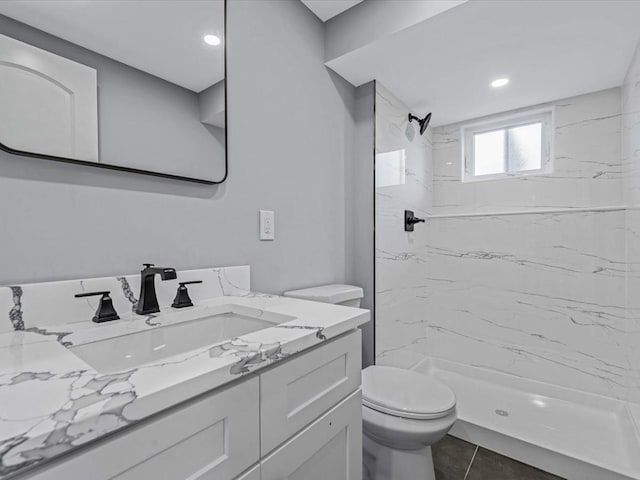 7 Pal Way, Plainview, NY 11803 - bathroom with toilet, vanity, a marble finish shower, tile patterned floors, and recessed lighting