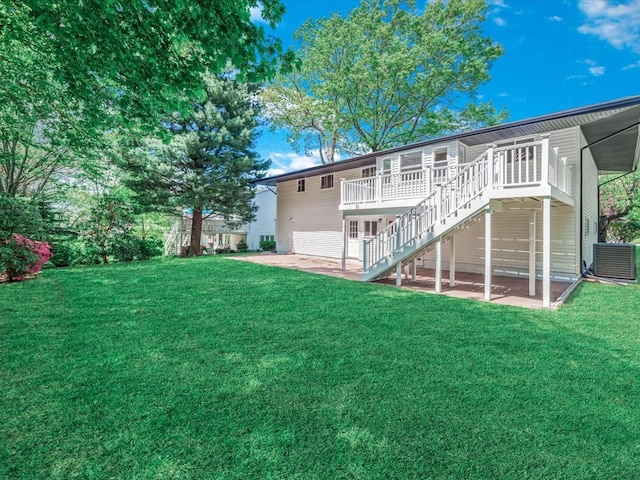 7 Pal Way, Plainview, NY 11803 - back of property with central AC, stairway, a yard, and a patio area