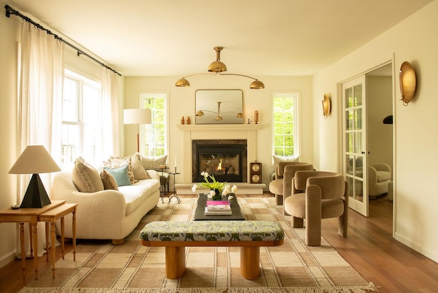 89 Stillerberg Strada, Kerhonkson, NY 12446 - living area featuring light wood-type flooring, baseboards, and a high end fireplace