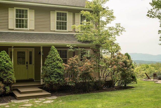 89 Stillerberg Strada, Kerhonkson, NY 12446 - view of front of property with a shingled roof, a front lawn, and a mountain view