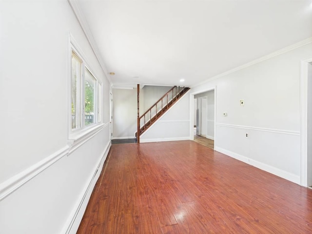 95 State Ave, Wyandanch, NY 11798 - unfurnished living room with stairway, wood finished floors, crown molding, baseboard heating, and baseboards
