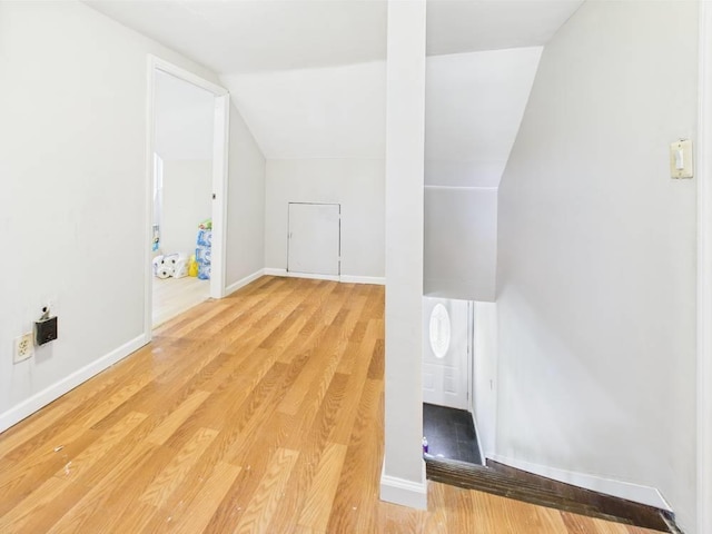 95 State Ave, Wyandanch, NY 11798 - additional living space featuring wood finished floors, lofted ceiling, and baseboards