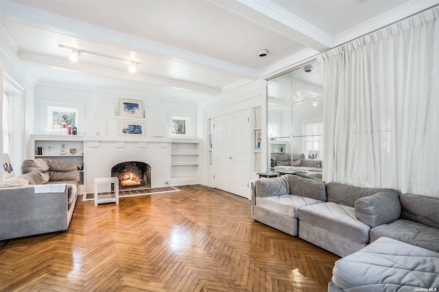 living room featuring a fireplace, plenty of natural light, beam ceiling, and crown molding