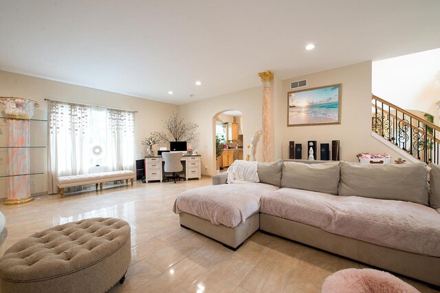 16 Kukas Rd, Monticello, NY 12701 - living room featuring arched walkways, an office area, recessed lighting, and stairway