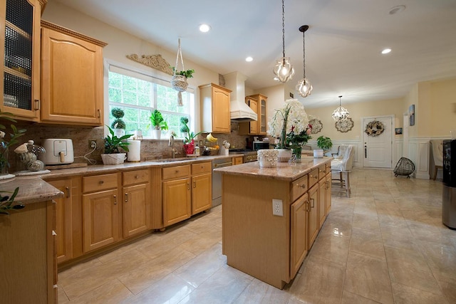 16 Kukas Rd, Monticello, NY 12701 - kitchen with a sink, dishwasher, a kitchen island, backsplash, and custom range hood