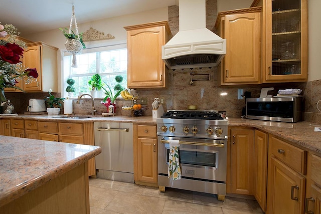 16 Kukas Rd, Monticello, NY 12701 - kitchen with appliances with stainless steel finishes, custom range hood, a sink, decorative backsplash, and light stone counters
