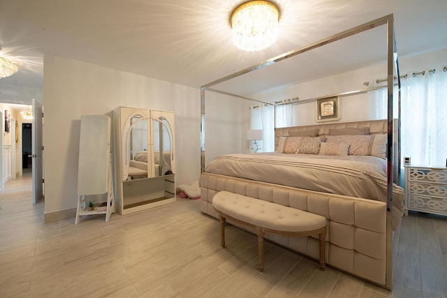 16 Kukas Rd, Monticello, NY 12701 - bedroom featuring a chandelier and wood finished floors