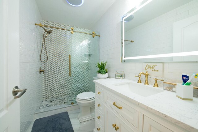 16 Kukas Rd, Monticello, NY 12701 - full bath featuring tile walls, toilet, a tile shower, and vanity