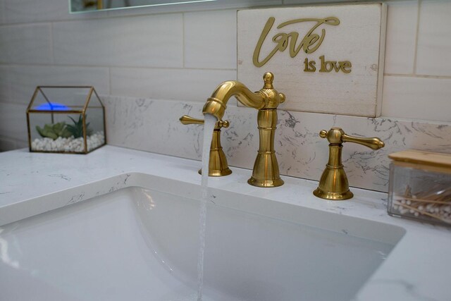16 Kukas Rd, Monticello, NY 12701 - bathroom view of a sink and decorative backsplash