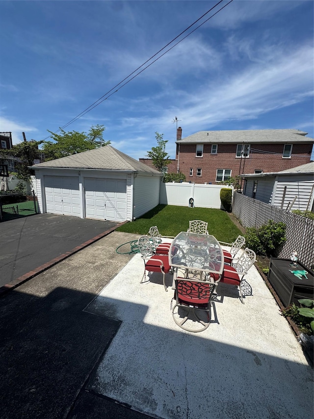 1039 Van Nest Ave, Bronx, NY 10461 - view of yard with an outbuilding and a detached garage