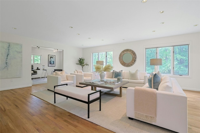 14 Cross Rd, Cortlandt Manor, NY 10567 - living room with light wood-style flooring, plenty of natural light, baseboards, and recessed lighting