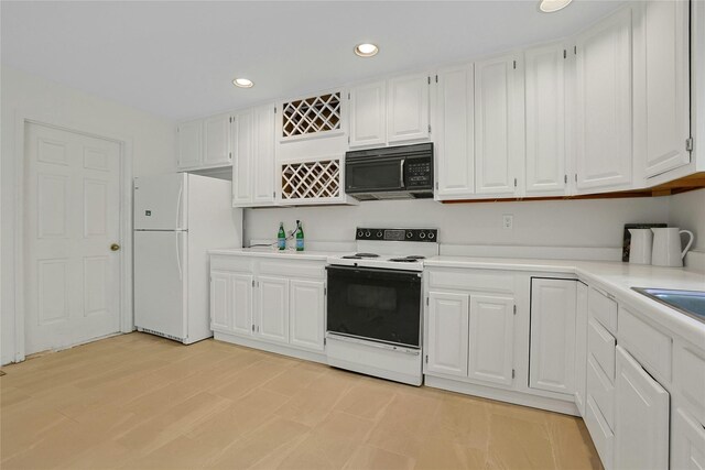 14 Cross Rd, Cortlandt Manor, NY 10567 - kitchen featuring white appliances, white cabinets, light countertops, and recessed lighting