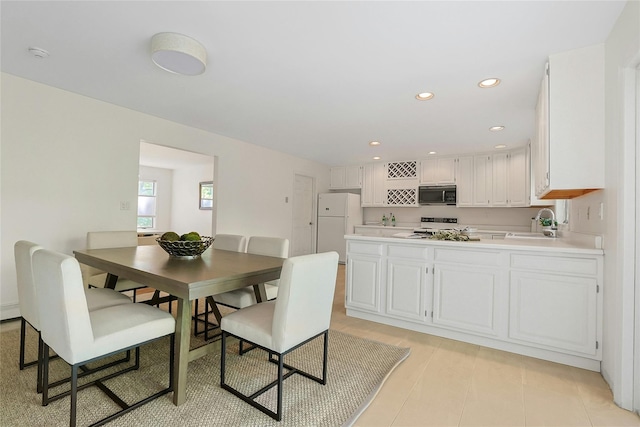 14 Cross Rd, Cortlandt Manor, NY 10567 - dining area featuring light tile patterned flooring and recessed lighting