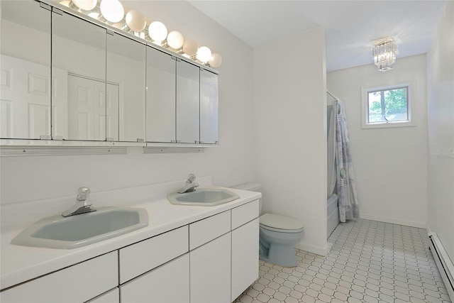14 Cross Rd, Cortlandt Manor, NY 10567 - full bathroom featuring a baseboard radiator, toilet, double vanity, shower / tub combo with curtain, and baseboards