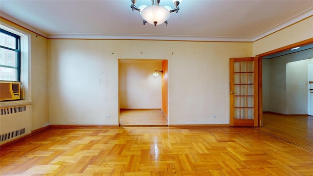 3250 Coney Island Ave Unit E15, Brooklyn, NY 11235 - unfurnished room with radiator heating unit, baseboards, ornamental molding, and cooling unit