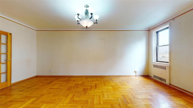 3250 Coney Island Ave Unit E15, Brooklyn, NY 11235 - empty room featuring radiator heating unit, a chandelier, ornamental molding, and baseboards
