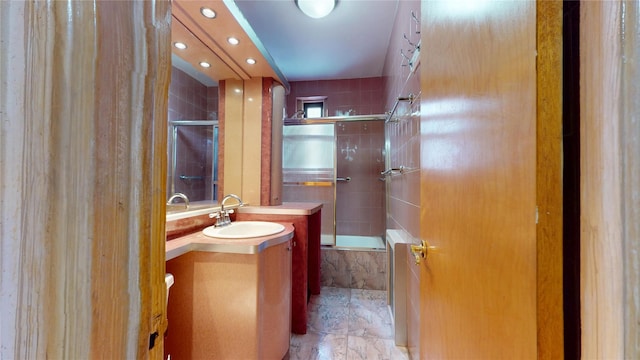 3250 Coney Island Ave Unit E15, Brooklyn, NY 11235 - bathroom with vanity, tiled shower / bath, and recessed lighting