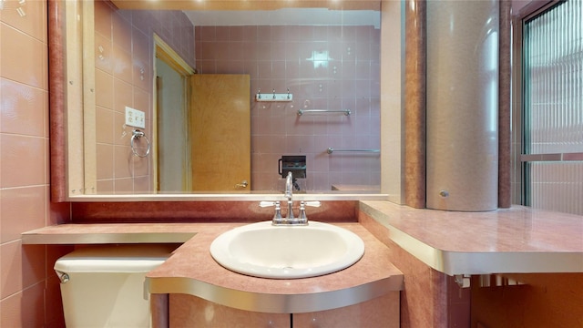 3250 Coney Island Ave Unit E15, Brooklyn, NY 11235 - bathroom with toilet, vanity, and tile walls
