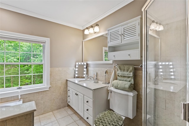 96 Warren St, Somers, NY 10589 - bathroom featuring tile walls, vanity, a stall shower, tile patterned flooring, and crown molding