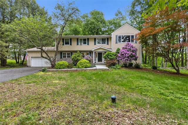 96 Warren St, Somers, NY 10589 - view of front of property featuring an attached garage, driveway, and a front lawn