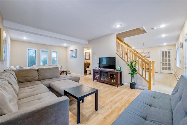 34 Marksman Ln, Levittown, NY 11756 - living room with stairway, recessed lighting, baseboards, and light wood finished floors