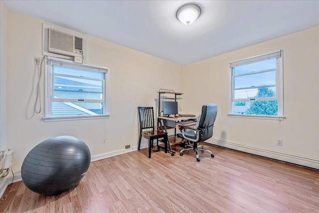 34 Marksman Ln, Levittown, NY 11756 - office space with light wood-type flooring, a wall unit AC, a baseboard heating unit, and baseboards