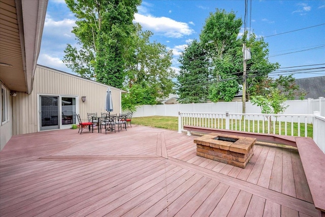 34 Marksman Ln, Levittown, NY 11756 - wooden deck with outdoor dining area