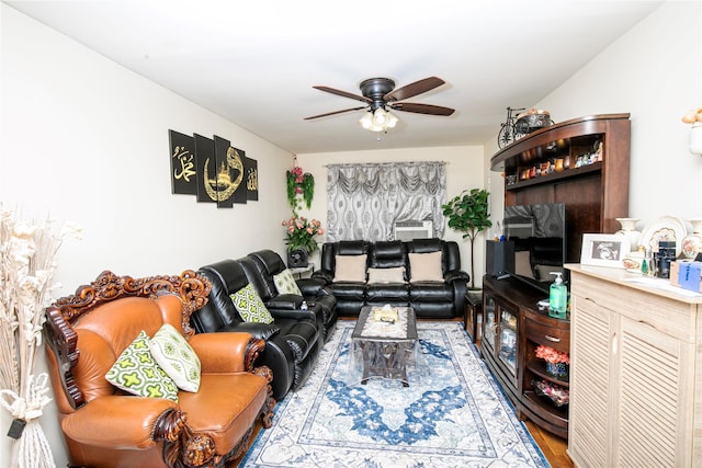10124 78th St, Ozone Park, NY 11416 - living area featuring ceiling fan and wood finished floors